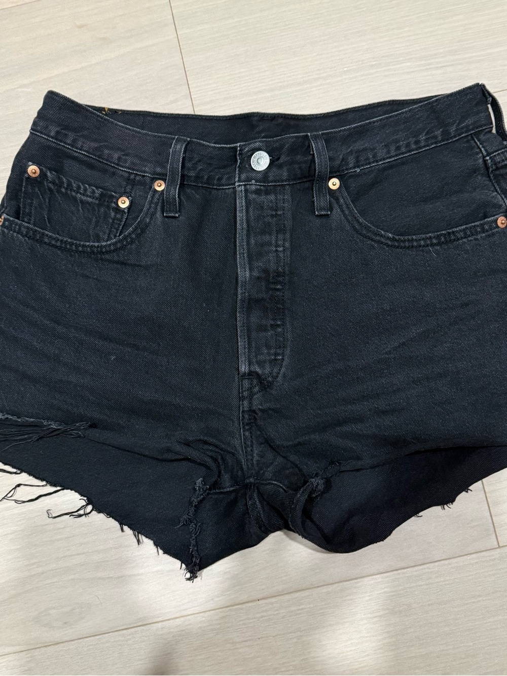 Levi’s Black High-Rise Denim Cutoff Shorts